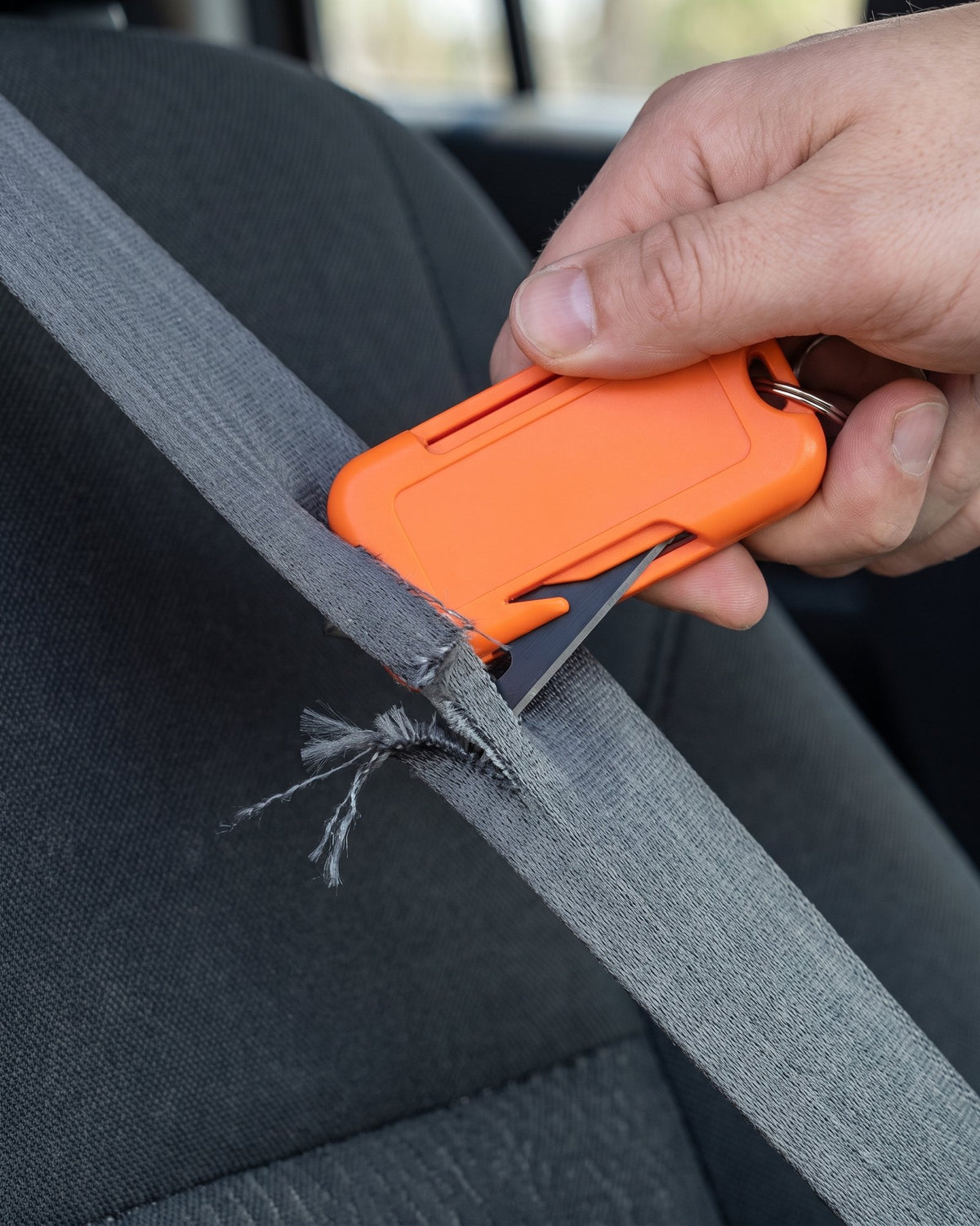EscapeKey recessed blade cutting a seatbelt
